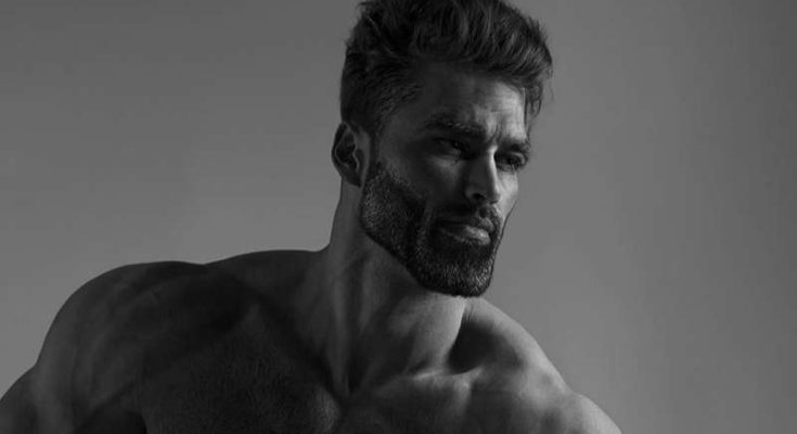 Đây là một meme hình trắng đen về một người đàn ông có thân hình lực lượng, cơ bắp nổi cuồn cuộn